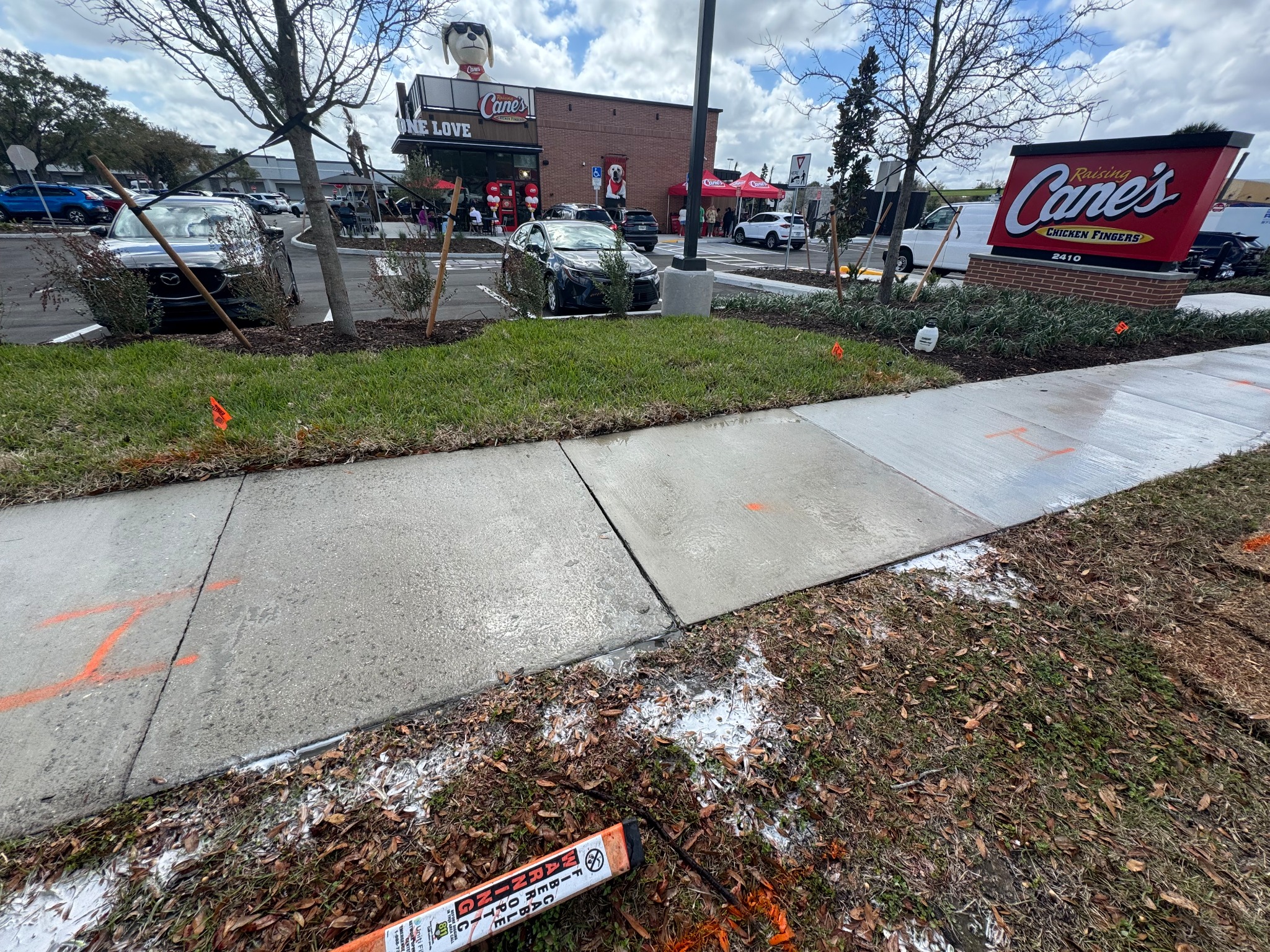 The same stretch of sidewalk after cleaning, back to its natural color.